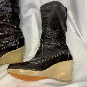 You by CROCS rain boots. Brown with wedge heel. Size 6.5. (37) Leather upper